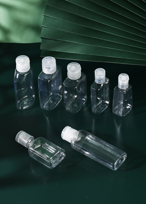 Flacone piatto ovale da 60 ml in PET con chiusura a scatto